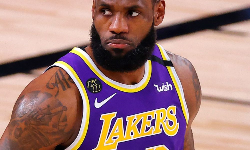Magic Johnson Salutes LeBron James After Witnessing Historic 40,000th Point in Person