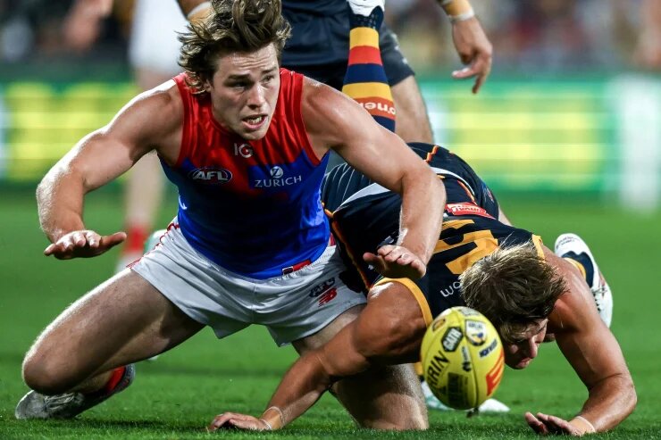 Demons charge to the top after nailing the ‘Adelaide double’; Strife for Pickett over high hit