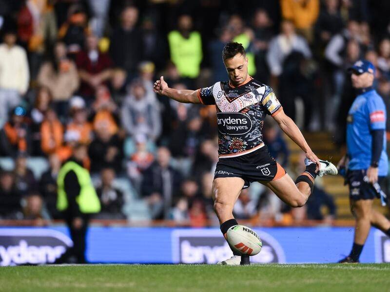 A player puts a stop to rumors about his NRL future by signing a four-year contract with the Manly Sea Eagles. 13